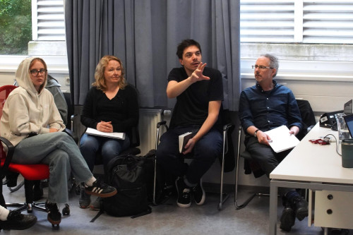 Participants of the Intensive I Living Labs listening to challenger Simon Olipitz.